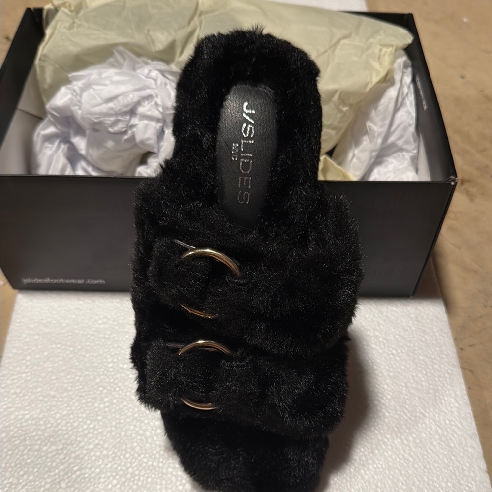J/SLIDES Black Furry Slippers with Metallic Buckles